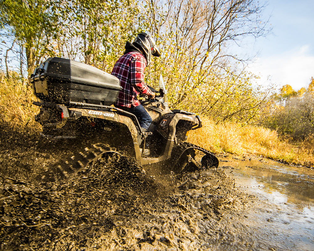 Rider on a ATV equipped with WS4 L-Ratio track kits